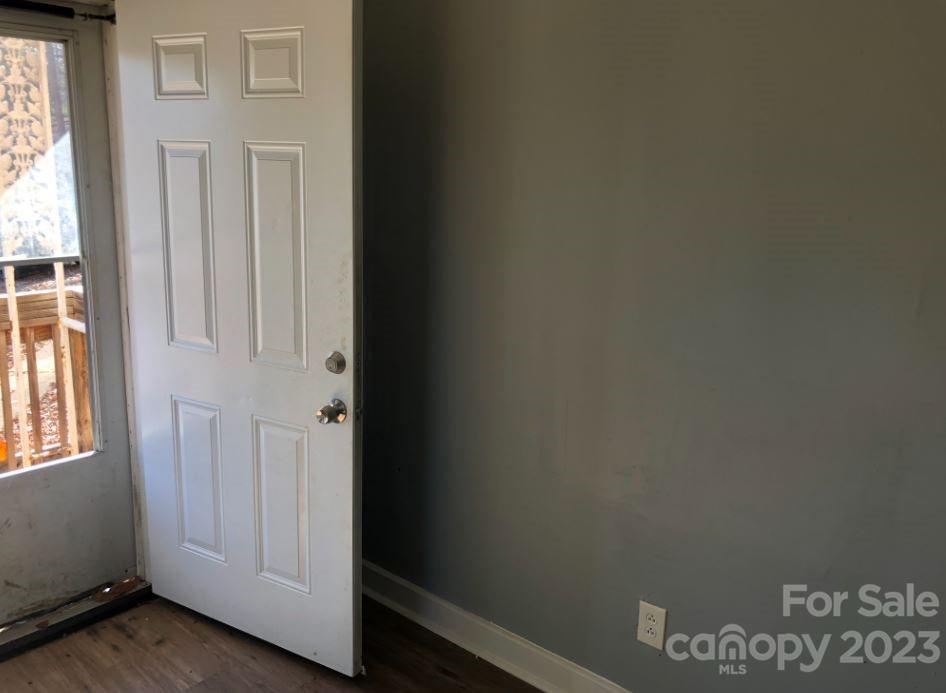 1702 Newland Road Charlotte, NC 28216 - Photo 20 of 34 an entryway with wooden floor and a window