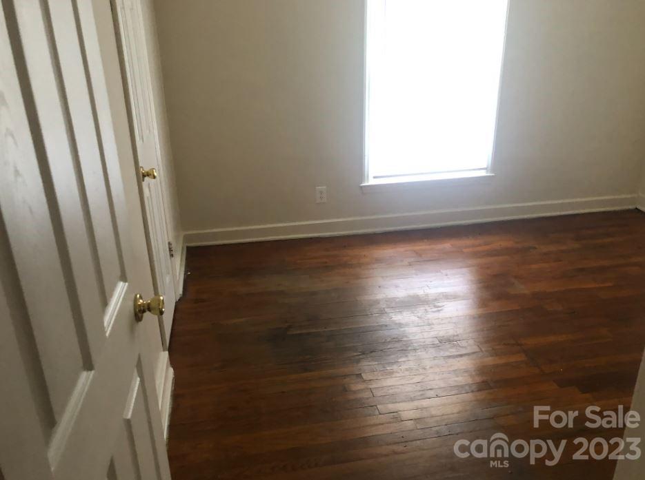 1702 Newland Road Charlotte, NC 28216 - Photo 22 of 34 a view of a room with wooden floor and window