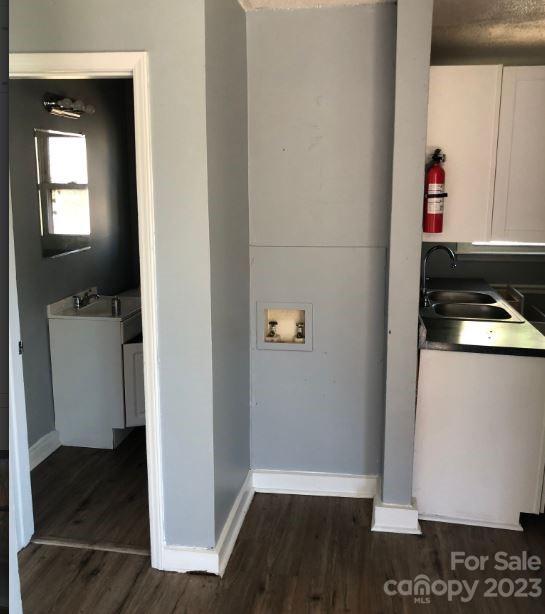 1702 Newland Road Charlotte, NC 28216 - Photo 24 of 34 a view of hallway with closet and wooden floor