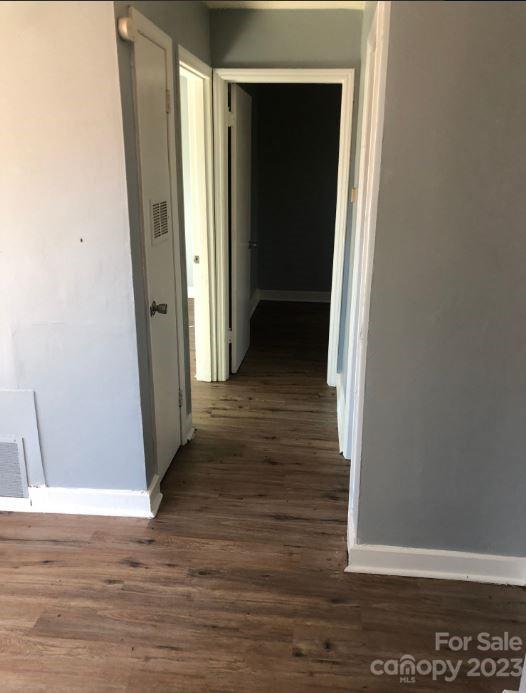 1702 Newland Road Charlotte, NC 28216 - Photo 27 of 34 a view of a hallway with wooden floor