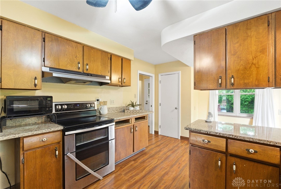 2439 Mayfair Road Dayton, OH 45405 - Photo 11 of 41 This spacious kitchen offers ample cabinet storage and convenient access to adjacent rooms.