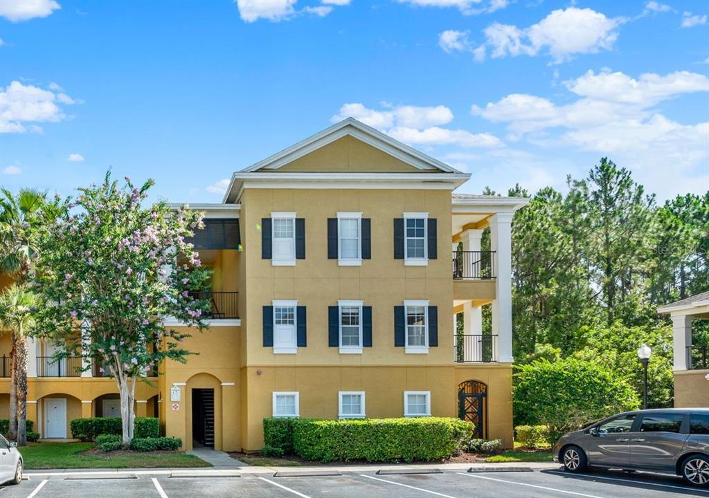 3757 Conroy Road, Unit 2525 Orlando, FL 32839 - Photo 1 of 1 a view of a big house with a yard and plants