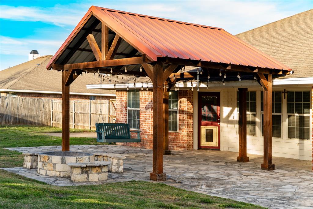 124 Topaz Circle Hewitt, TX 76643 - Photo 24 of 28 View of patio featuring an outdoor fire pit