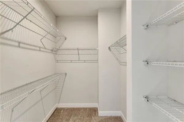 a view of small space with racks on the wall