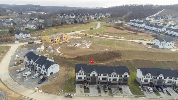 an aerial view of residential house with outdoor space