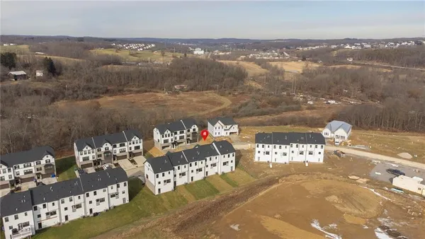 a view of water heater room with yard