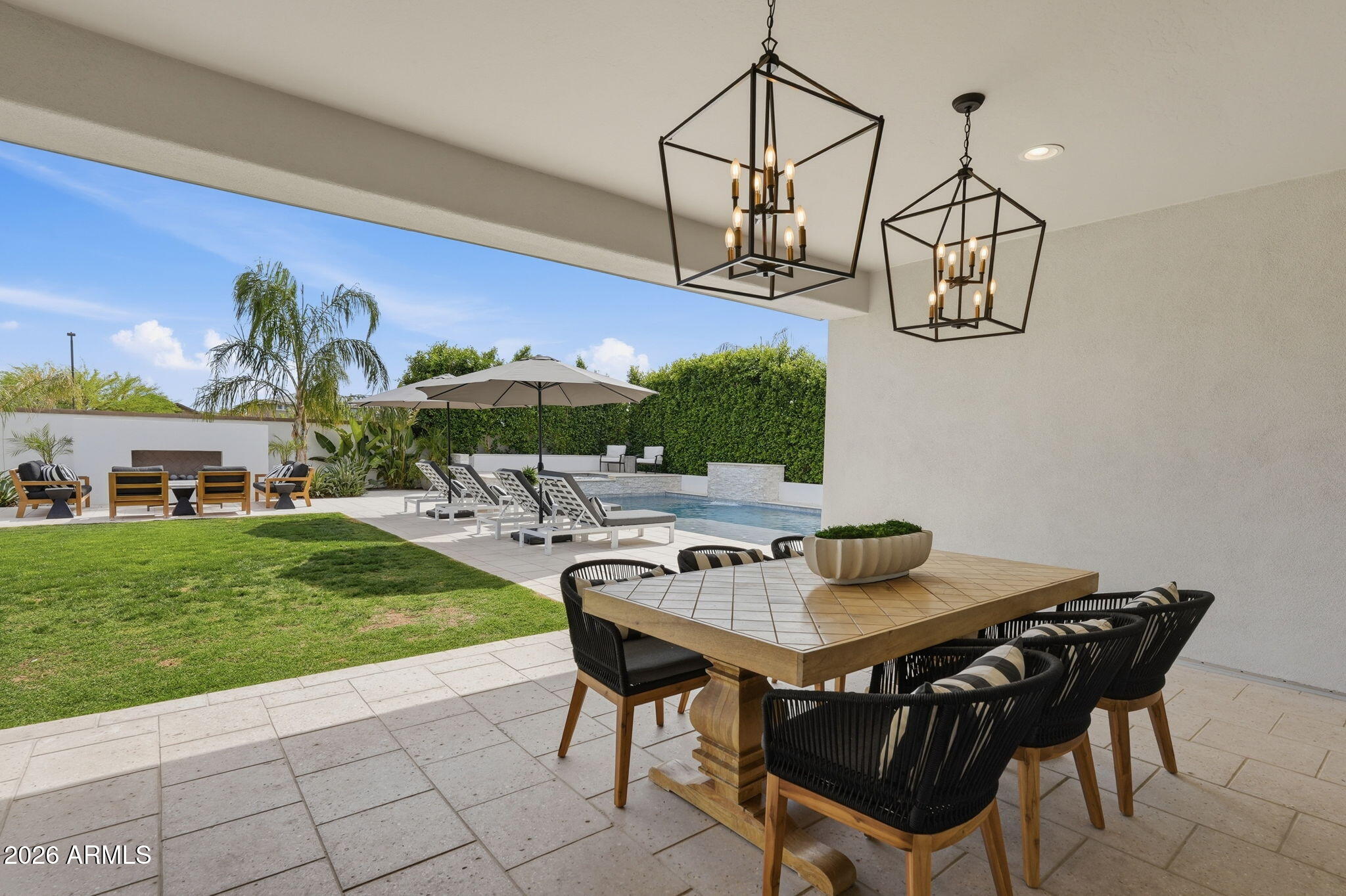 22607 East Russet Road Queen Creek, AZ 85142 - Photo 48 of 64 a view of a table and chairs in patio