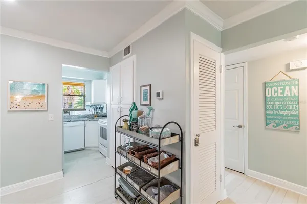 a room with furniture a rug and a window