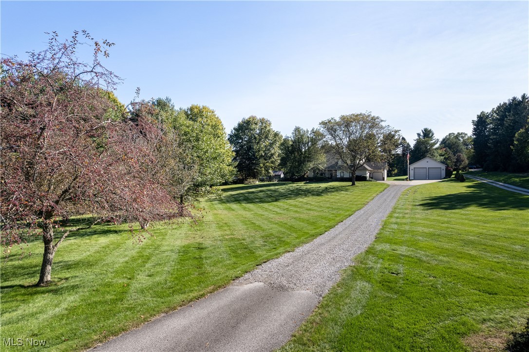 310 Reimer Road Wadsworth, OH 44281 - Photo 4 of 38 View of property's drive and lawn.