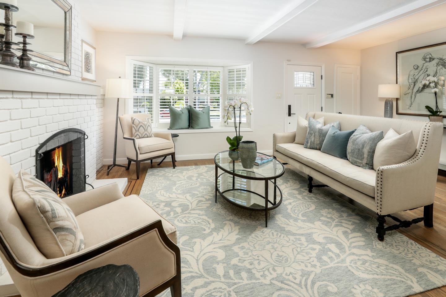 1104 Cambridge Road Burlingame, CA 94010 - Photo 11 of 34 a living room with furniture and a fireplace