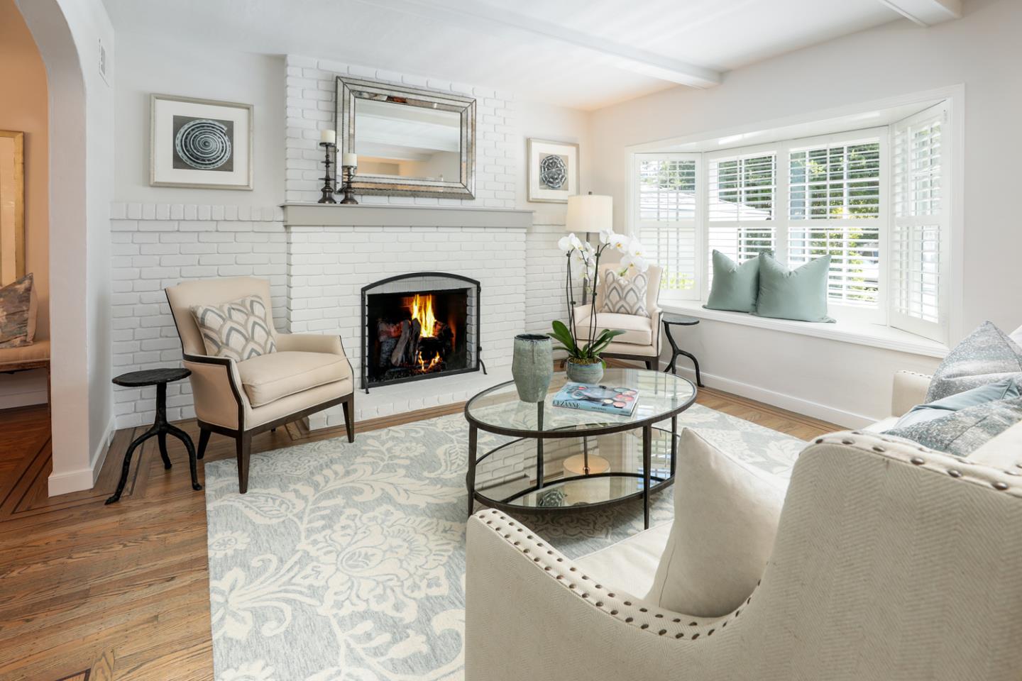 1104 Cambridge Road Burlingame, CA 94010 - Photo 12 of 34 a living room with furniture and a fireplace