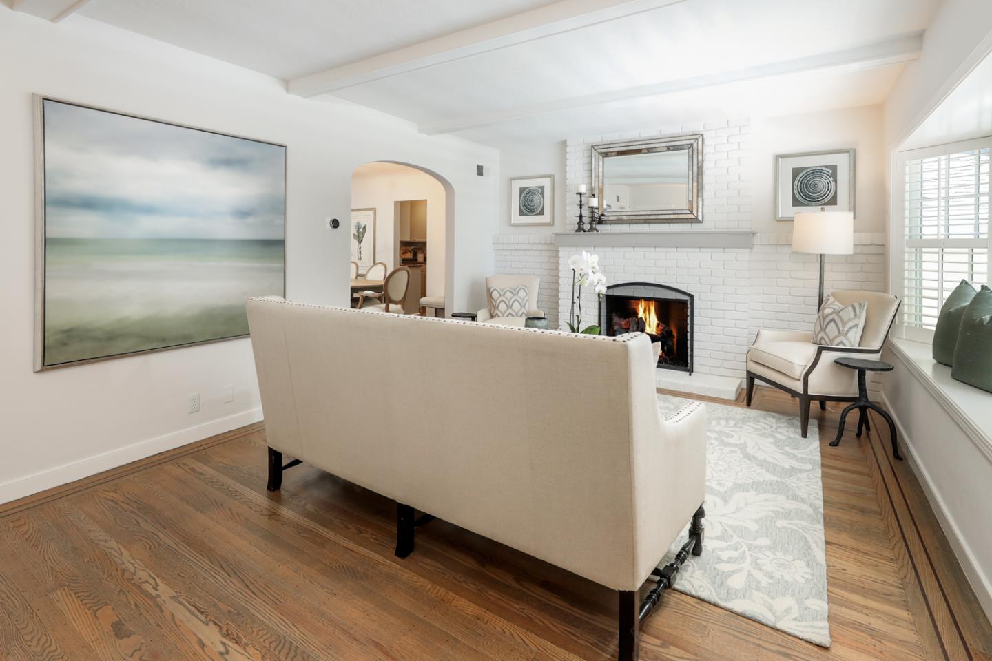 1104 Cambridge Road Burlingame, CA 94010 - Photo 13 of 34 a living room with furniture and a fireplace