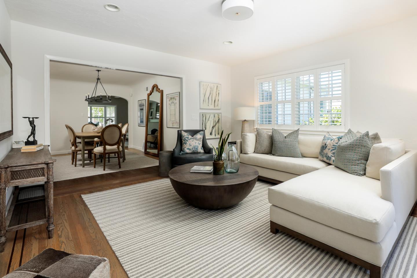 1104 Cambridge Road Burlingame, CA 94010 - Photo 17 of 34 a living room with furniture and a wooden floor