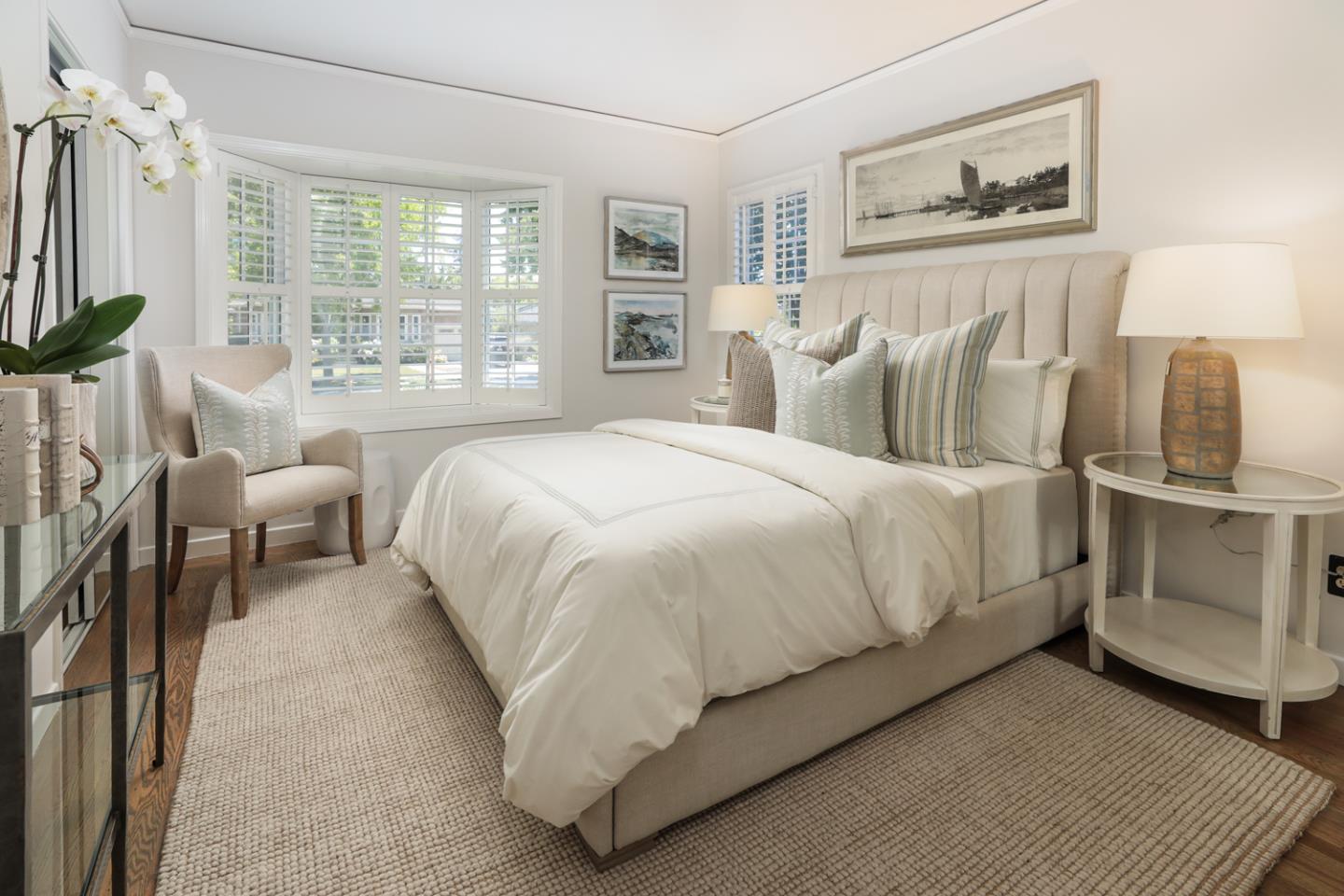 1104 Cambridge Road Burlingame, CA 94010 - Photo 20 of 34 a bed room with a bed and a chair