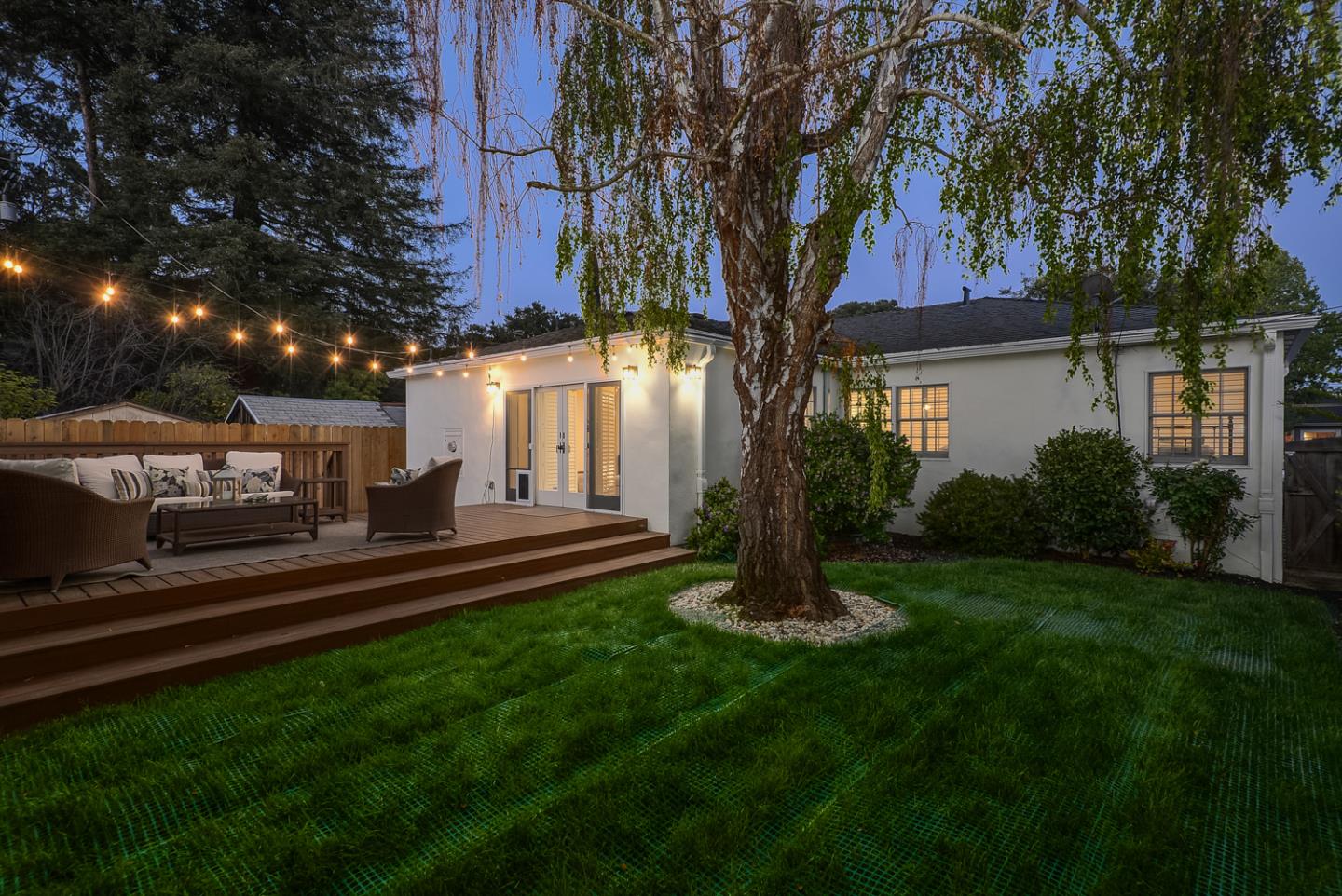 1104 Cambridge Road Burlingame, CA 94010 - Photo 2 of 34 a front view of a house with a garden