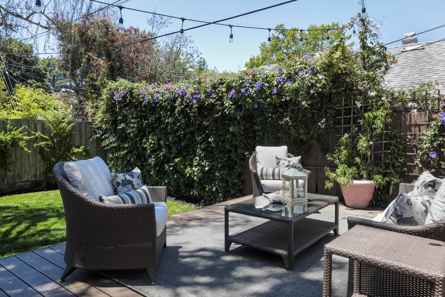 1104 Cambridge Road Burlingame, CA 94010 - Photo 27 of 34 a view of a patio with couple of chairs and a fire pit