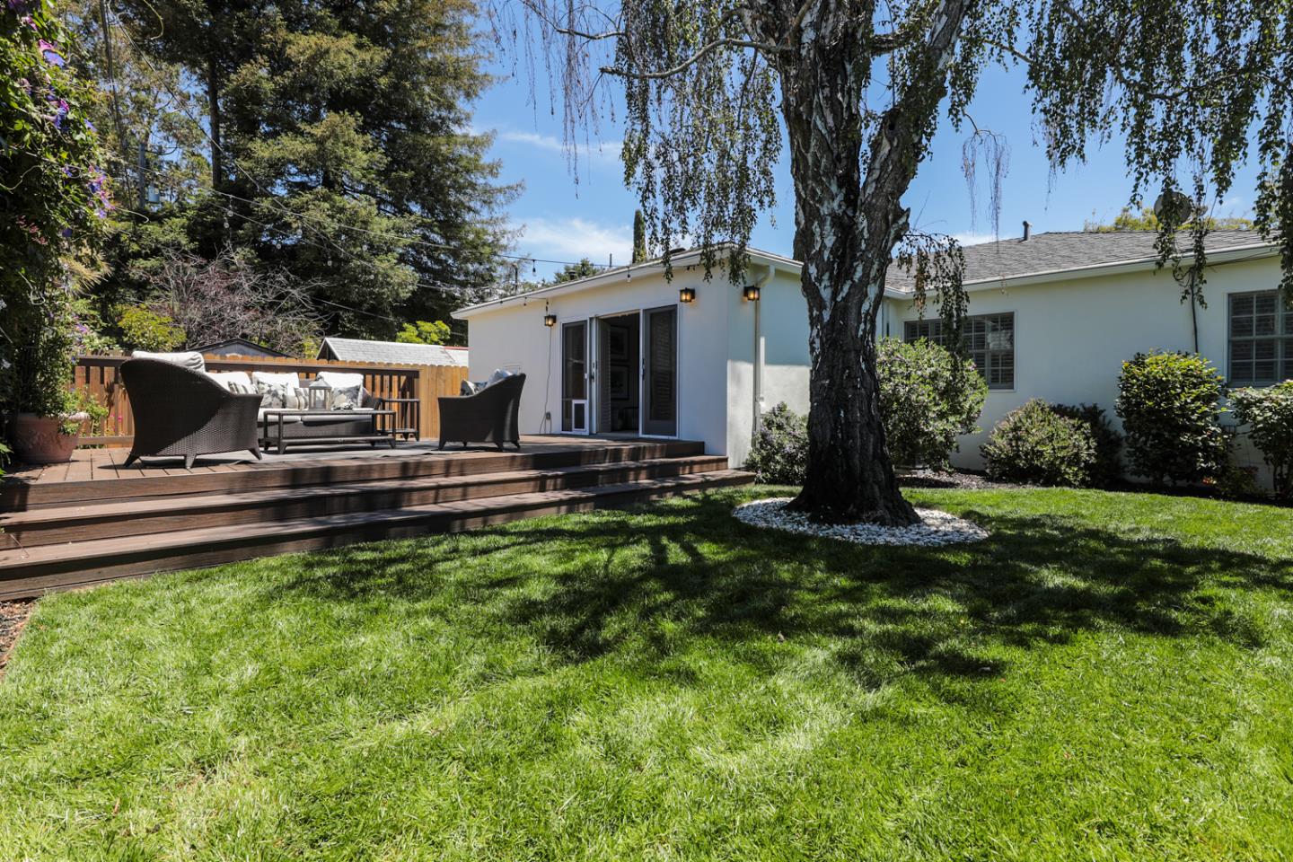 1104 Cambridge Road Burlingame, CA 94010 - Photo 30 of 34 a view of a house with backyard and sitting area
