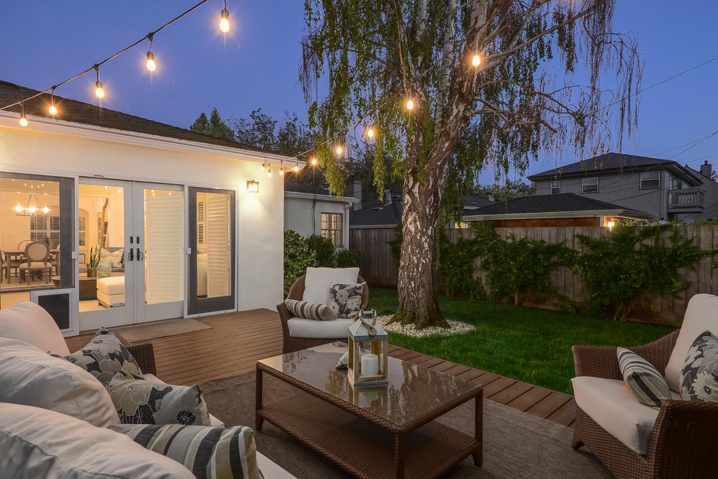 1104 Cambridge Road Burlingame, CA 94010 - Photo 3 of 34 a view of a patio with couches and a fire pit