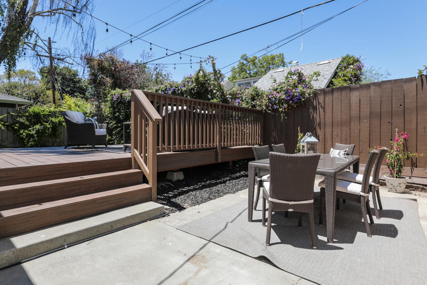 1104 Cambridge Road Burlingame, CA 94010 - Photo 31 of 34 a view of backyard with seating space and wooden fence
