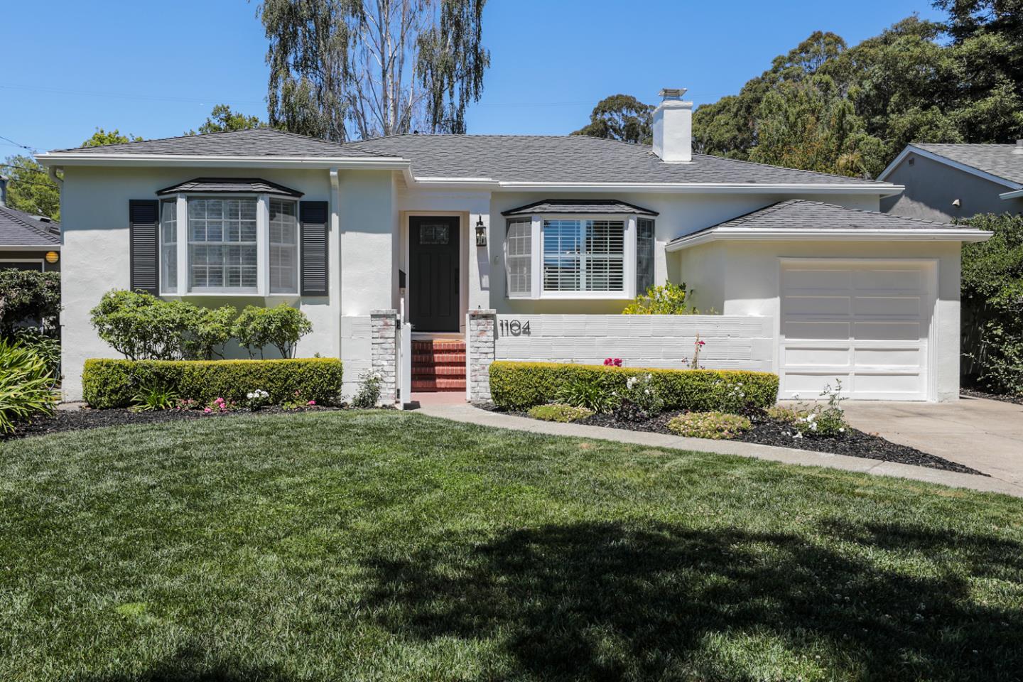 1104 Cambridge Road Burlingame, CA 94010 - Photo 6 of 34 front view of a house with a yard