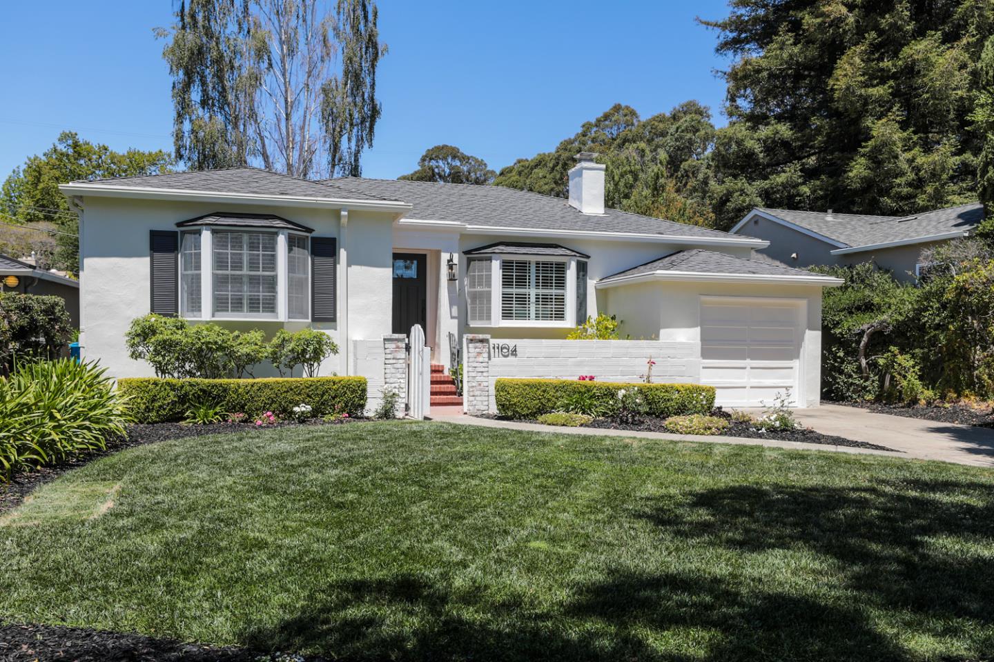 1104 Cambridge Road Burlingame, CA 94010 - Photo 7 of 34 front view of a house and a yard