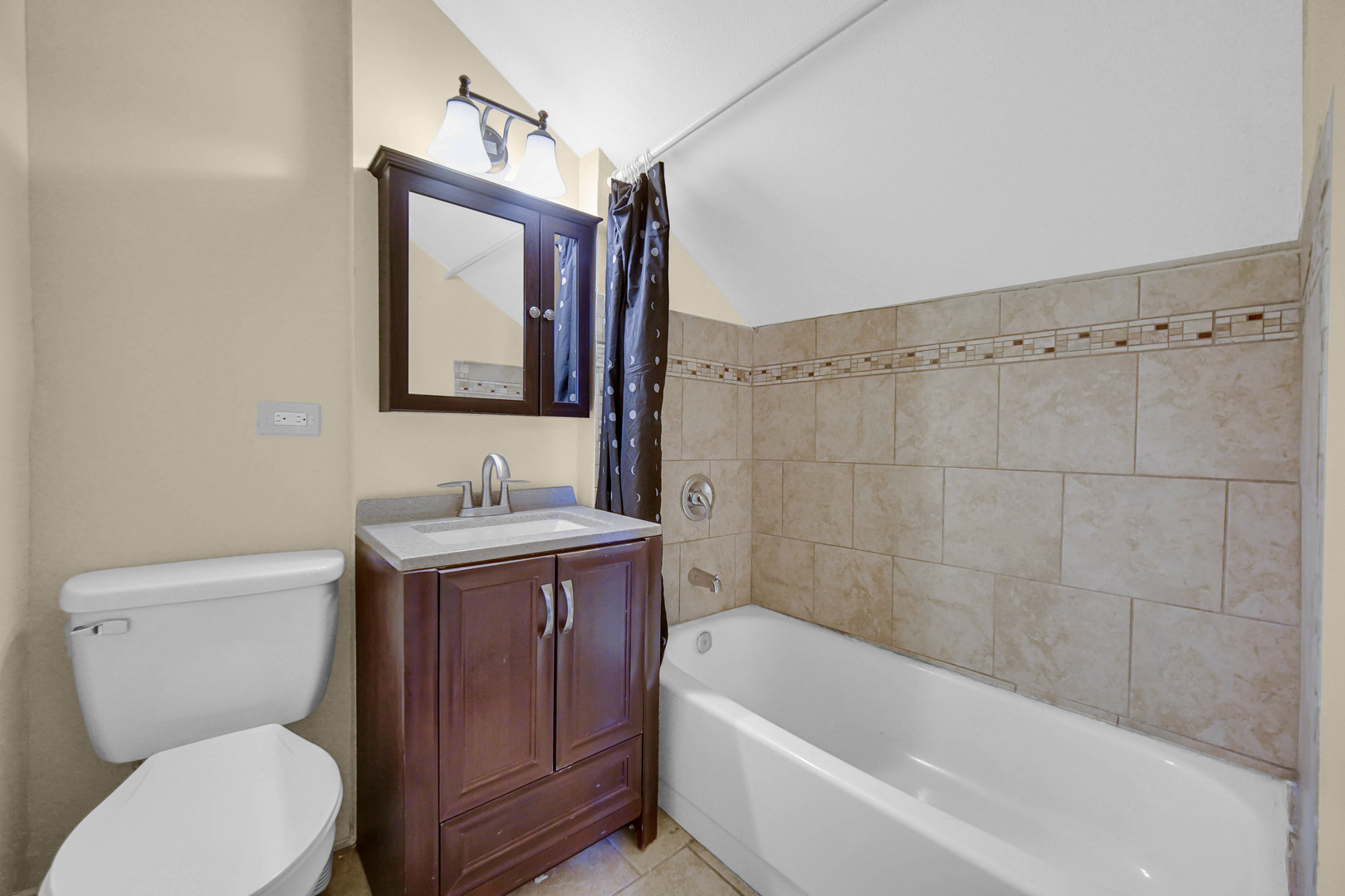 1635 Linden Road Homewood, IL 60430 - Photo 14 of 20 a bathroom with a sink a toilet and bathtub