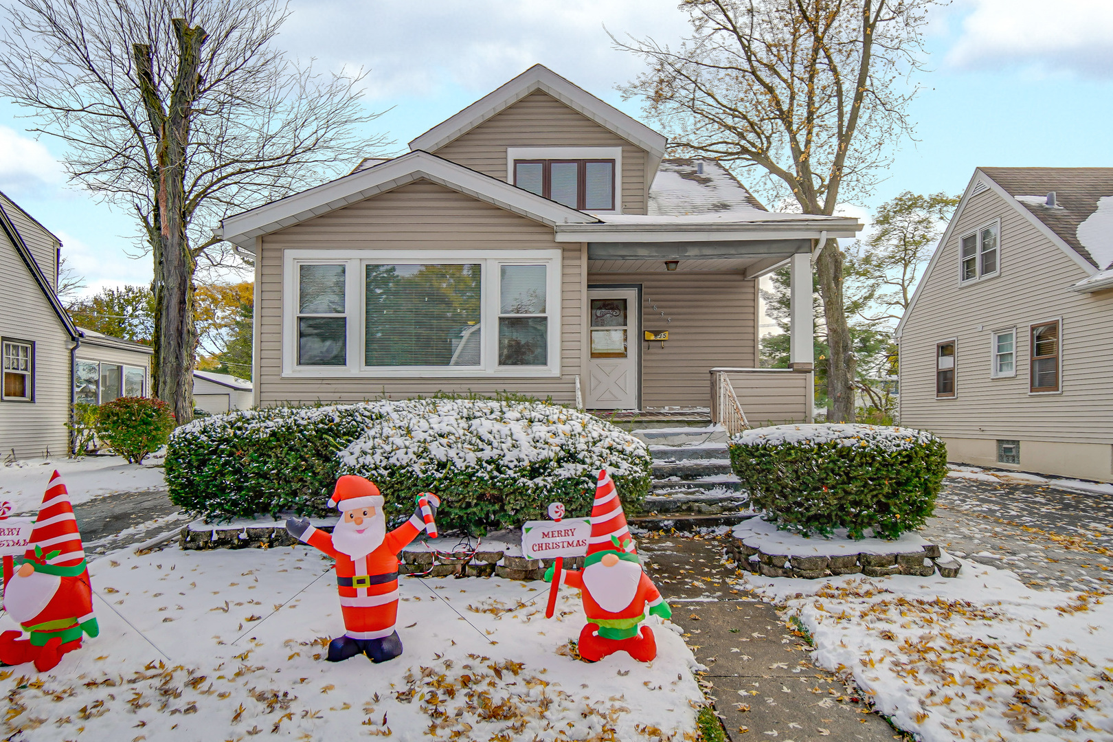 1635 Linden Road Homewood, IL 60430 - Photo 2 of 20 a front view of a house with a porch