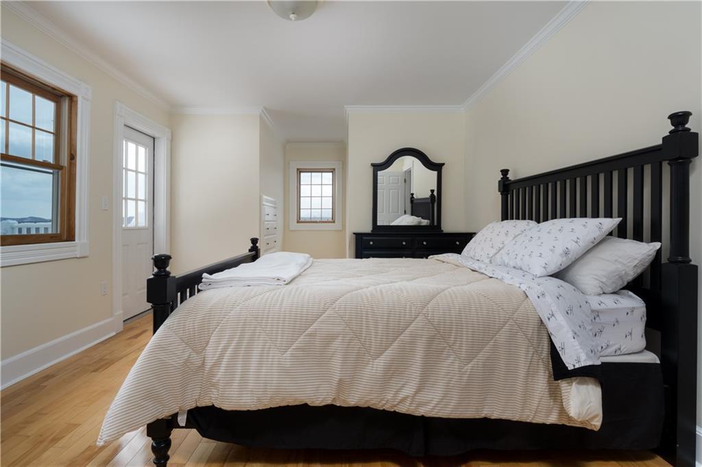 279 Intervale Road Bethel, ME 04217 - Photo 17 of 31 Upstairs bedroom with balcony.