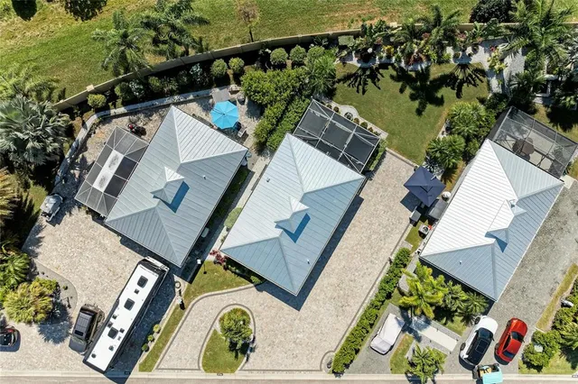 a view of a chairs and table in the patio
