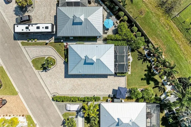 a potted plant sitting in front of a house