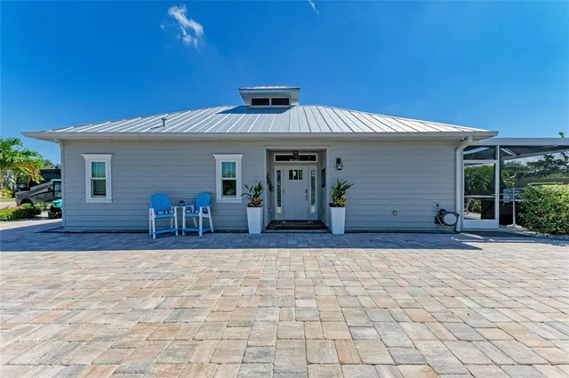 a kitchen with stainless steel appliances granite countertop a stove and a refrigerator