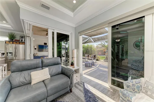 a kitchen with stainless steel appliances granite countertop sink stove and refrigerator