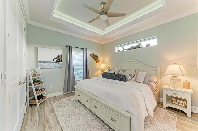 a bathroom with a toilet and a shower curtain