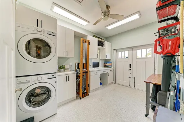 a view of a house with backyard sitting area and garden
