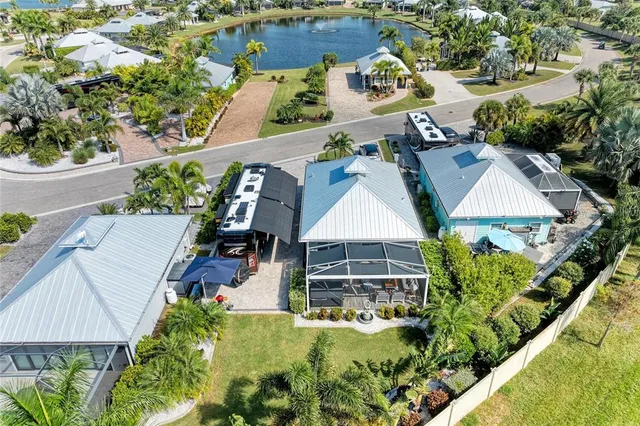 an aerial view of a house with swimming pool