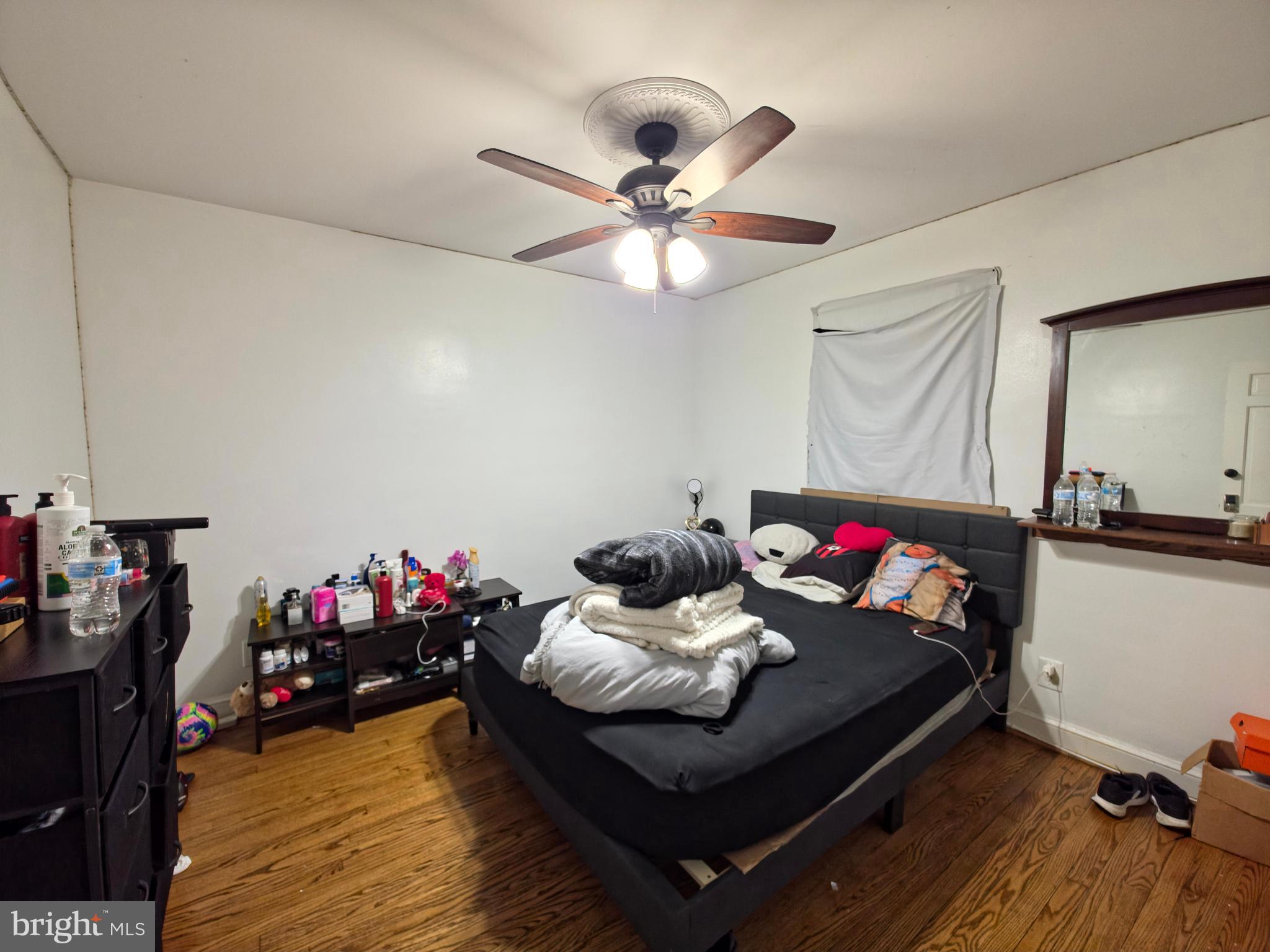 7450 Bensville Road Waldorf, MD 20603 - Photo 11 of 41 a living room with furniture and a wooden floor