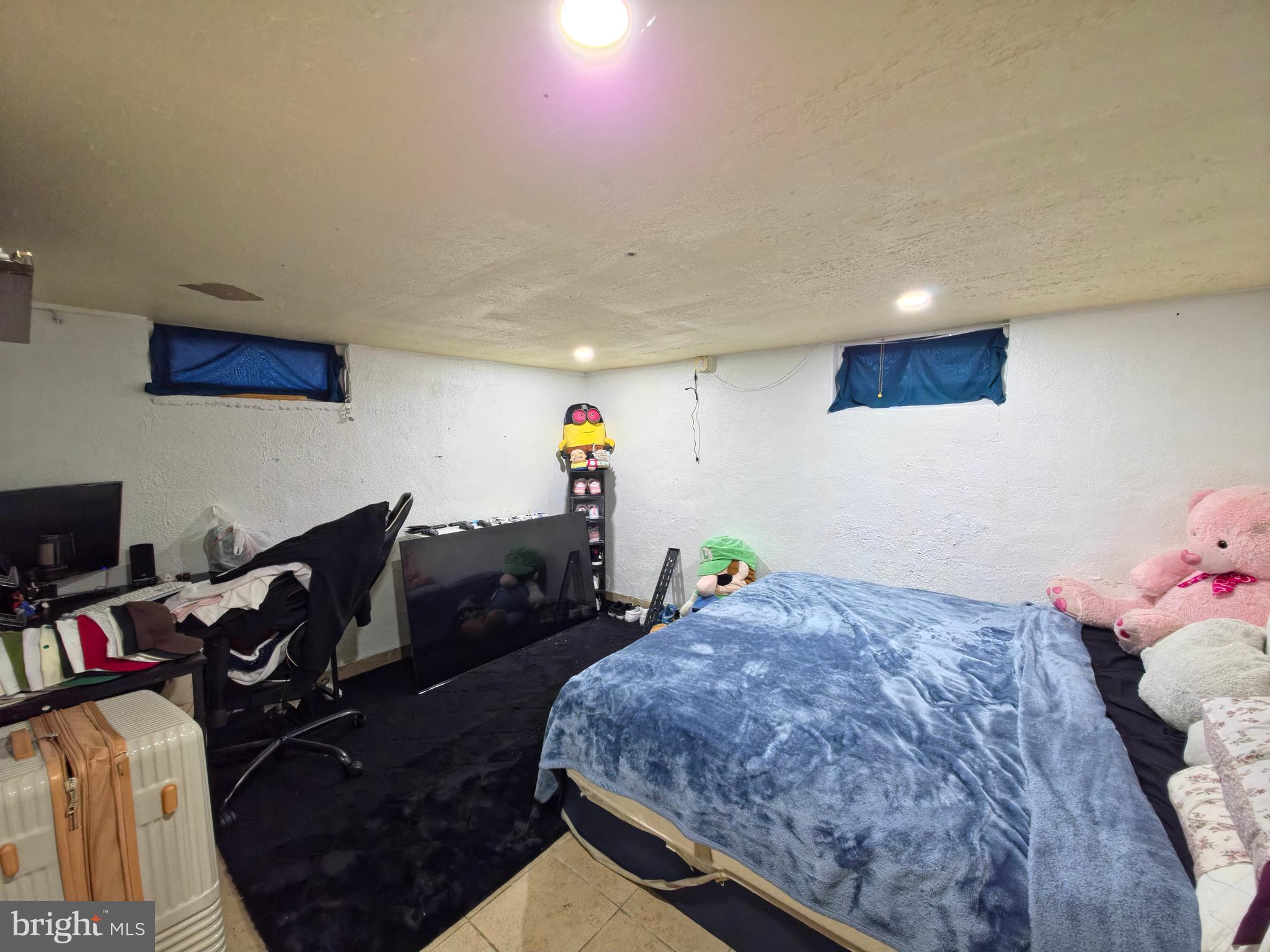 7450 Bensville Road Waldorf, MD 20603 - Photo 19 of 41 a bed room with a bed and furniture