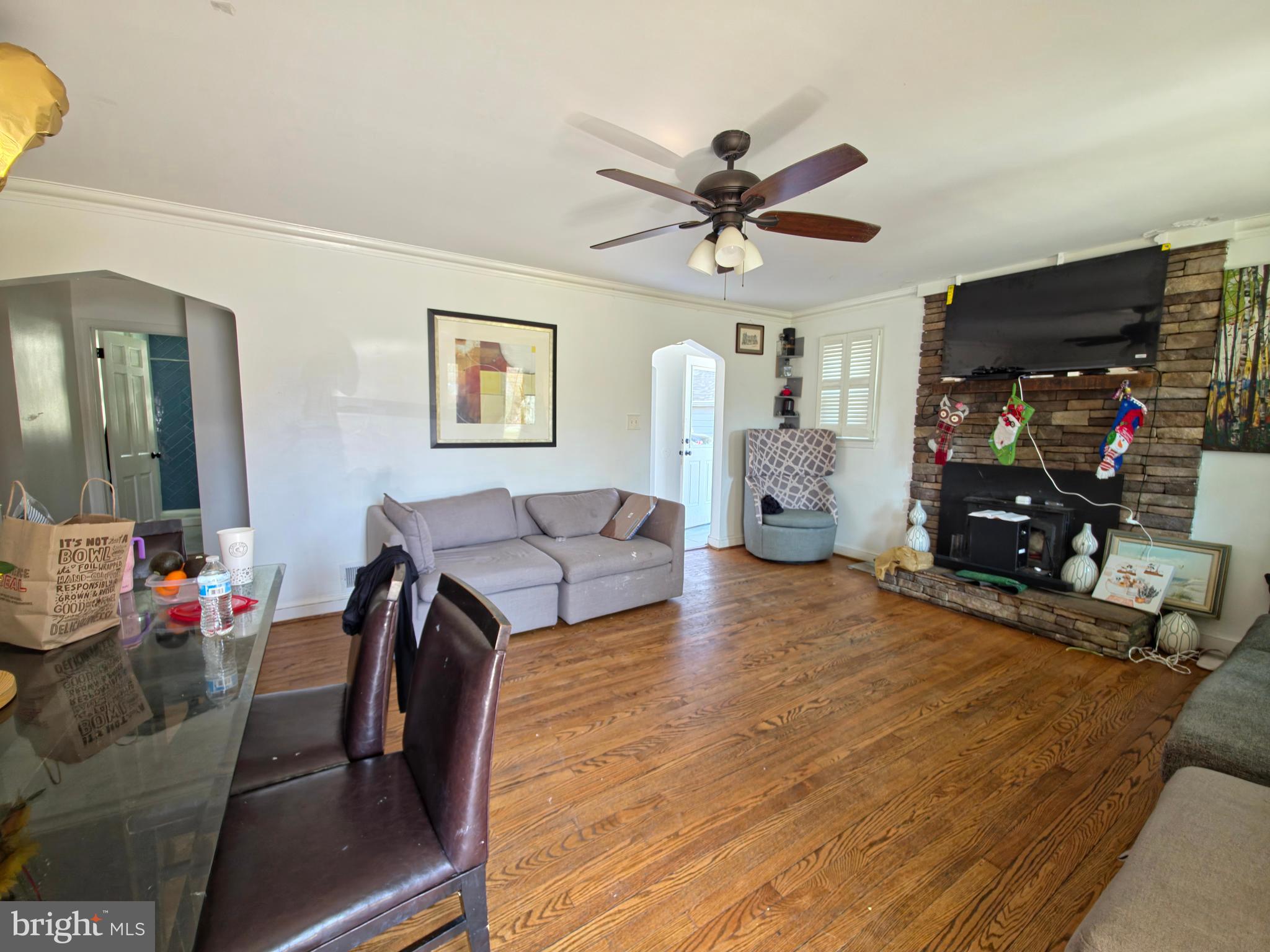 7450 Bensville Road Waldorf, MD 20603 - Photo 3 of 41 a living room with furniture and a flat screen tv