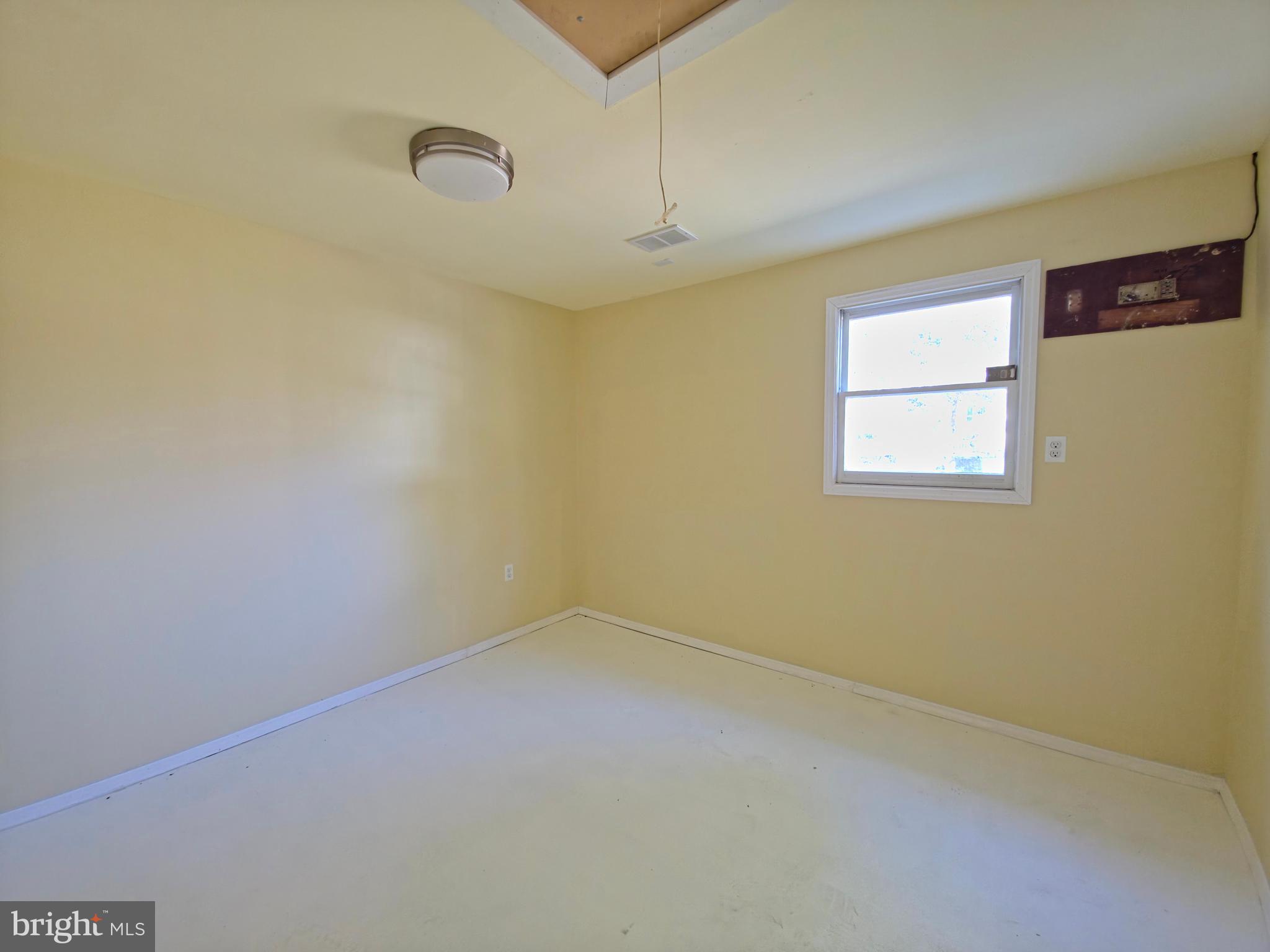 7450 Bensville Road Waldorf, MD 20603 - Photo 31 of 41 an empty room with a window