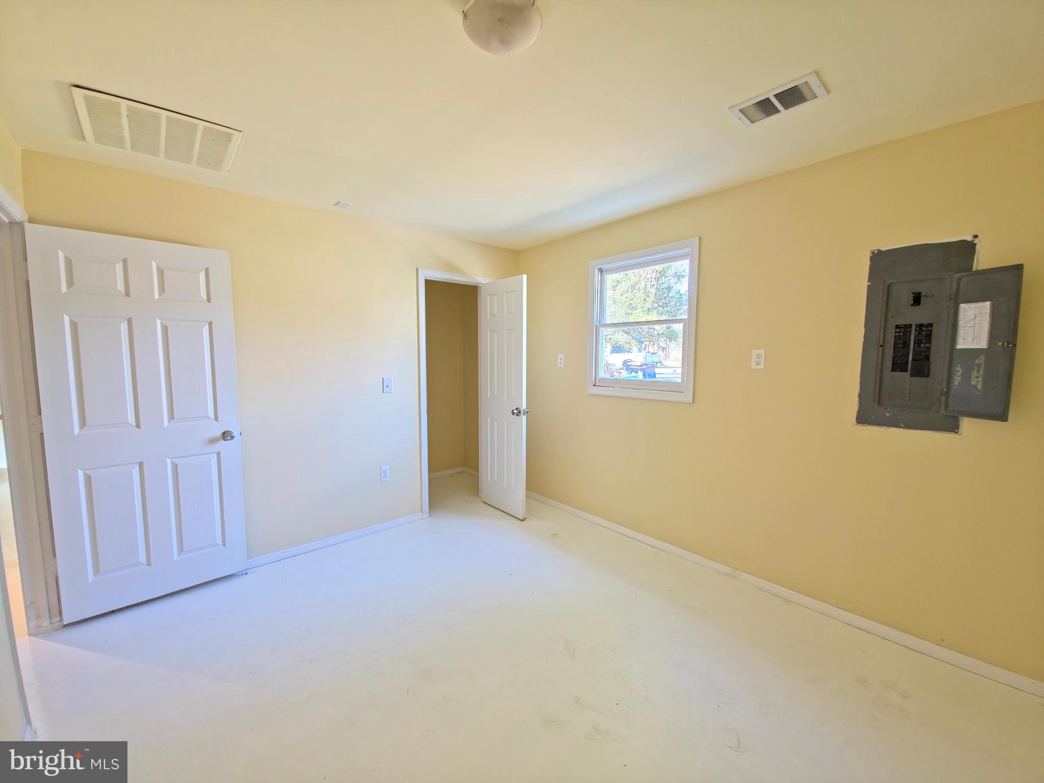 7450 Bensville Road Waldorf, MD 20603 - Photo 35 of 41 a view of an empty room with windows