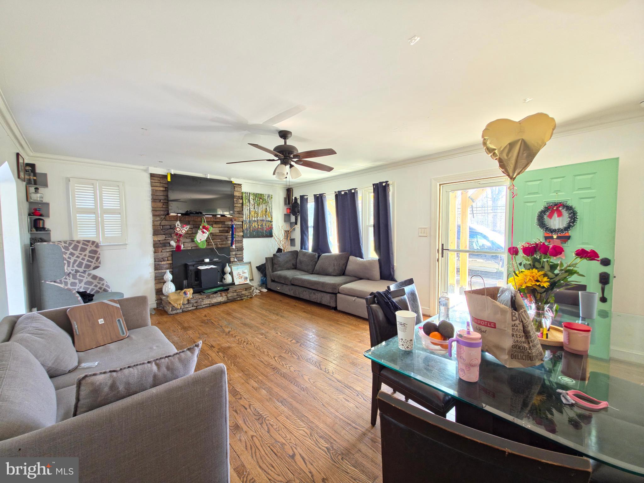 7450 Bensville Road Waldorf, MD 20603 - Photo 8 of 41 a living room with furniture and a flat screen tv