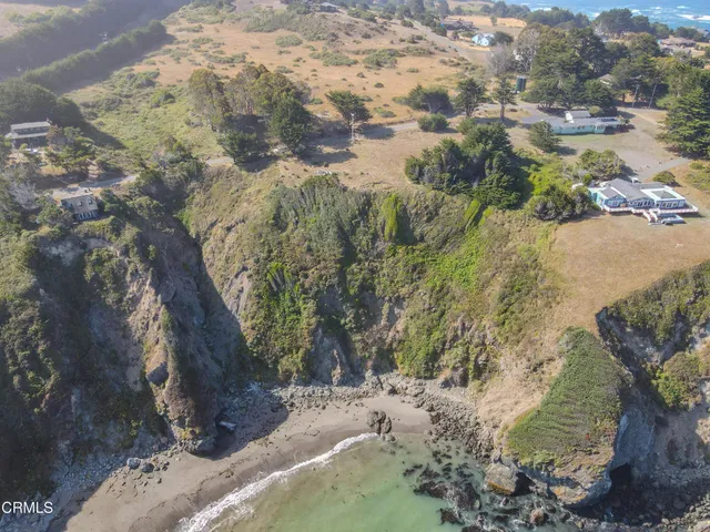 a view of a lake with mountains in the background