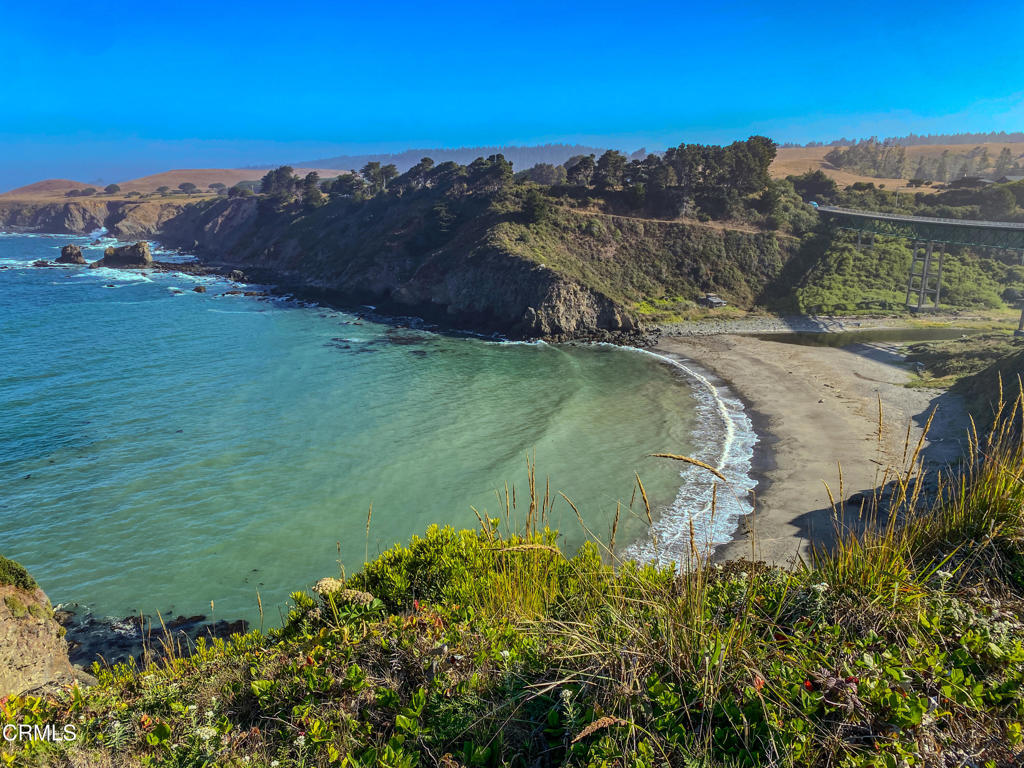 34100 Pacific Reefs Road Albion, CA 95410 - Photo 3 of 20 a view of a field with an ocean