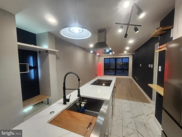 a room with gym equipment and a mirror