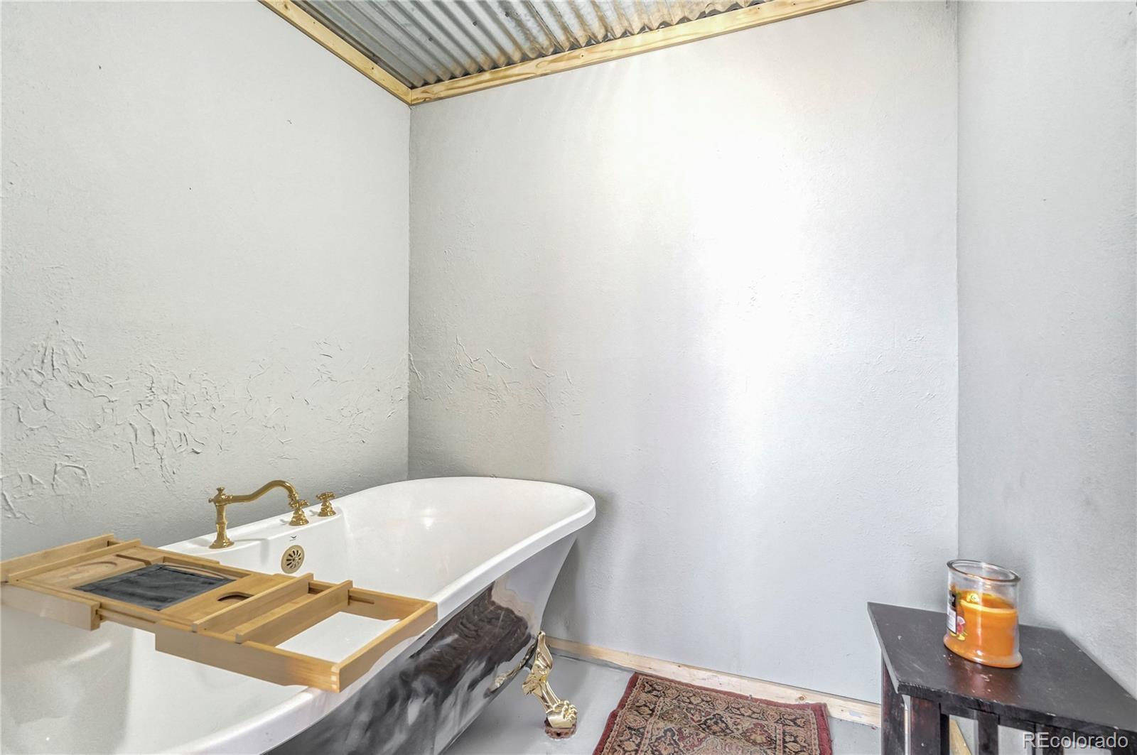 3549 County Road 650 Rye, CO 81069 - Photo 19 of 39 a bathroom with a sink and a mirror