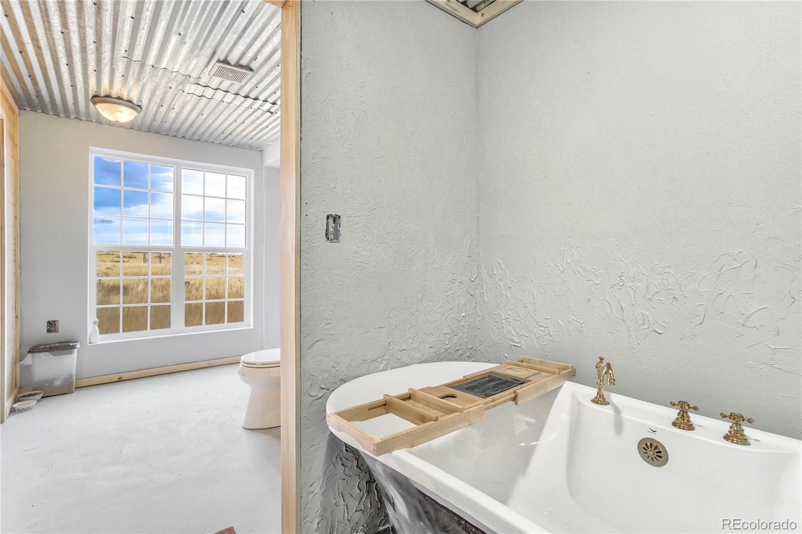 3549 County Road 650 Rye, CO 81069 - Photo 20 of 39 a bathroom with a sink and a bathtub