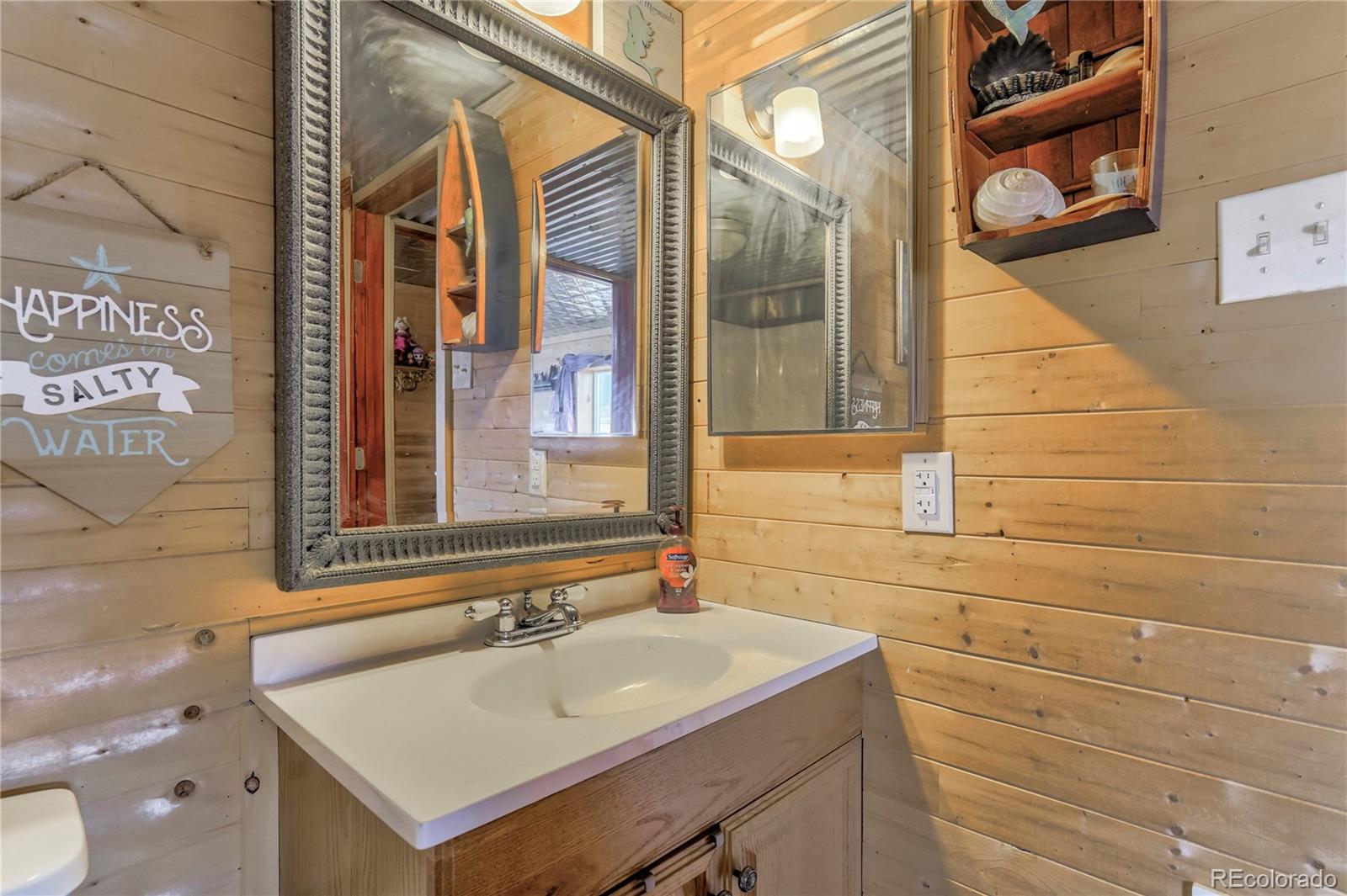 3549 County Road 650 Rye, CO 81069 - Photo 29 of 39 a bathroom with a sink and a mirror