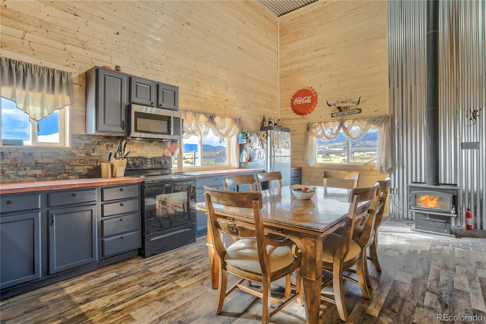 3549 County Road 650 Rye, CO 81069 - Photo 30 of 39 a kitchen with a table and chairs in it