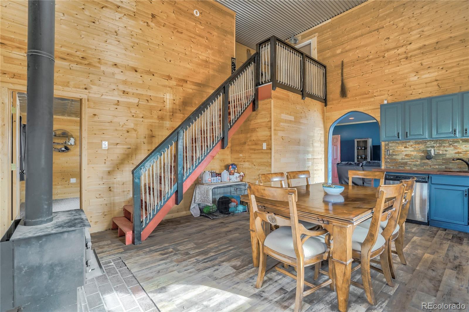 3549 County Road 650 Rye, CO 81069 - Photo 10 of 39 a dining room with furniture entryway and wooden floor