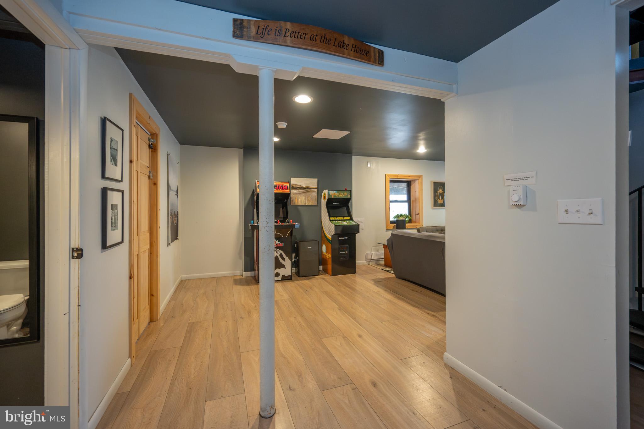 527 Deer Run Lane Swanton, MD 21561 - Photo 33 of 51 a view of a room with wooden floor